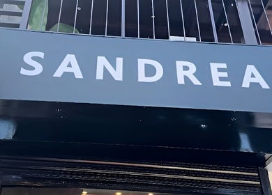Entrance sign of Sandrea Salon Parañaque located in Parañaque, Metro Manila, PH with clear bold lettering.