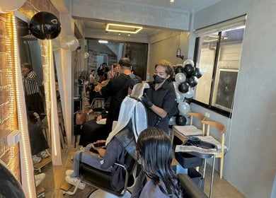 Stylists working at Sandrea Salon Parañaque, a chic beauty venue in Parañaque, Metro Manila, PH.