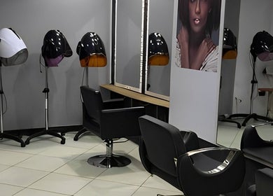 Modern salon chairs and mirrors at Elora Hair & Beauty Studio, Nairobi, Nairobi County, KE.