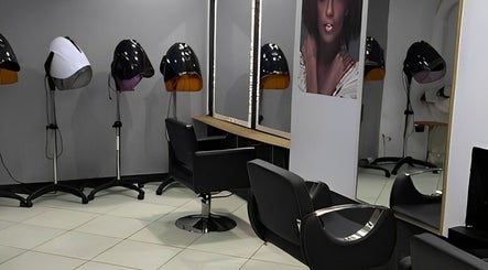 Modern salon chairs and mirrors at Elora Hair & Beauty Studio, Nairobi, Nairobi County, KE.