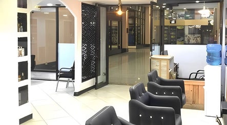 Modern salon interior at Elora Hair & Beauty Studio in Nairobi, Nairobi County, KE. Comfortable seating and stylish decor.