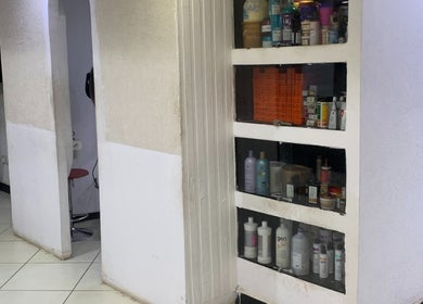 Elora Hair & Beauty Studio's product shelves in Nairobi, Nairobi County, KE showcasing a variety of beauty products.
