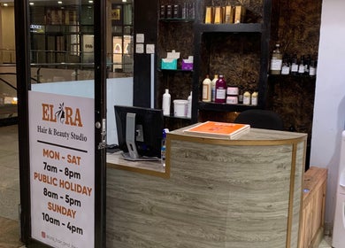 Reception area of Elora Hair & Beauty Studio, Nairobi, Nairobi County, KE, showcasing modern decor.