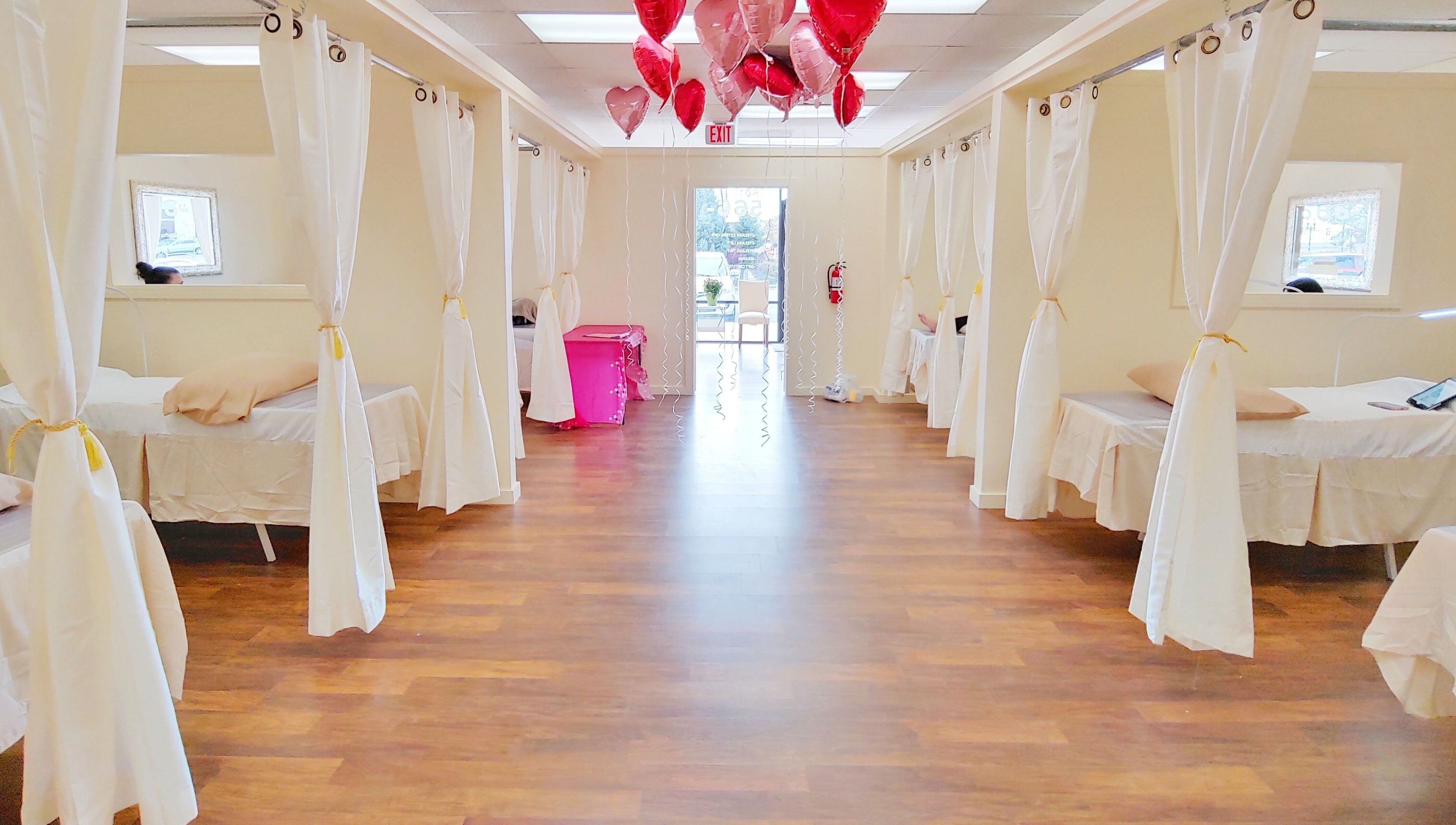Spacious treatment area with white curtains at Star Lash Studio-West Jordan, West Jordan, Utah, US.