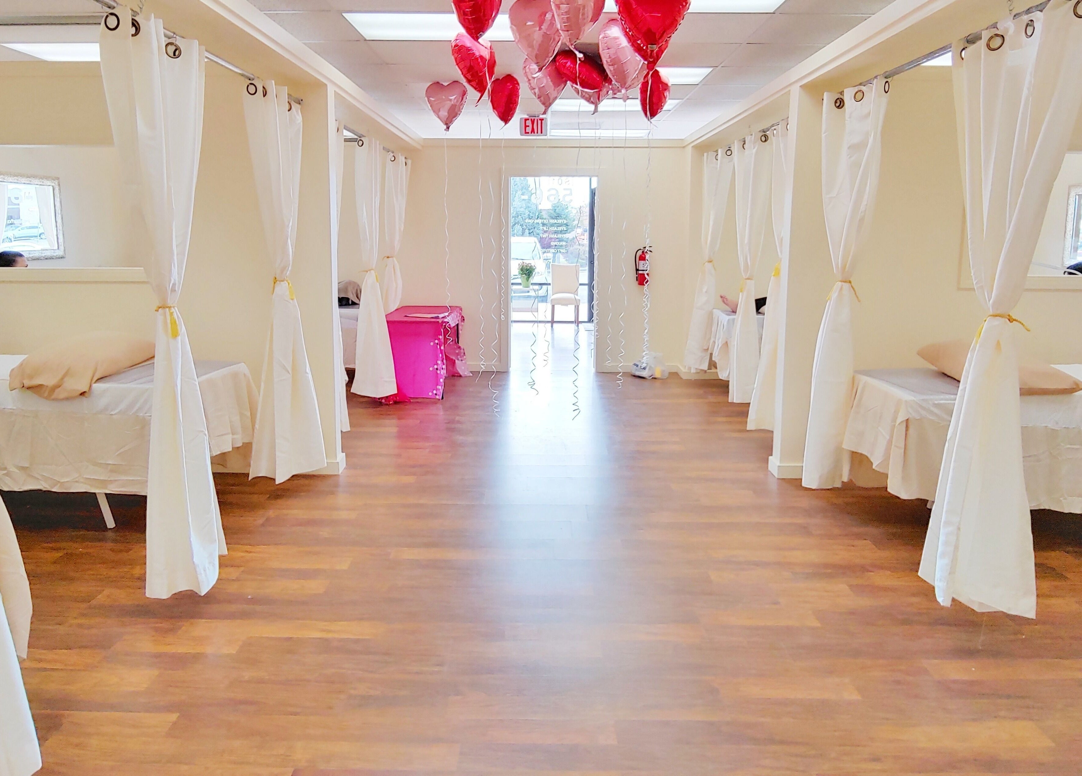 Spacious treatment area with white curtains at Star Lash Studio-West Jordan, West Jordan, Utah, US.