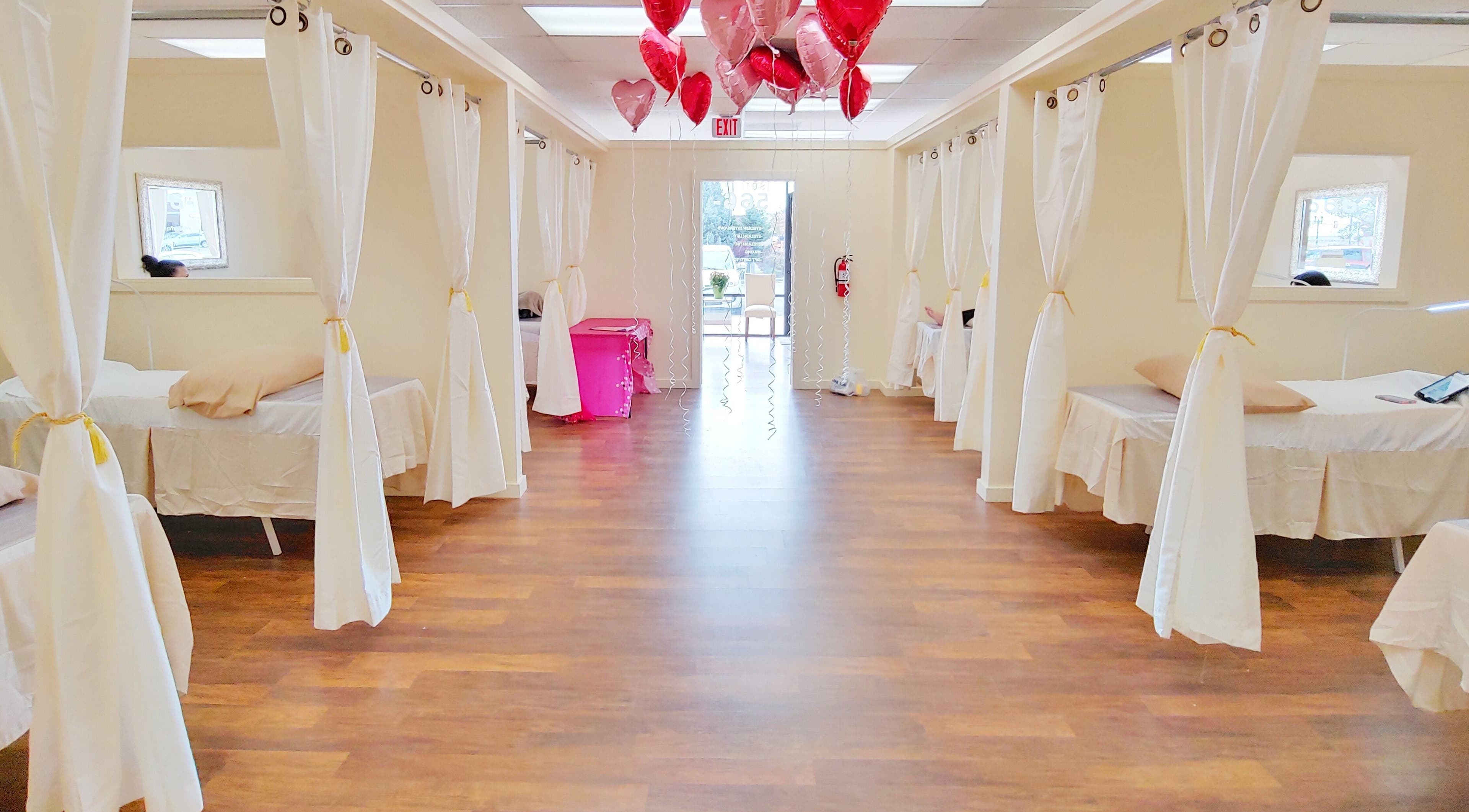 Spacious treatment area with white curtains at Star Lash Studio-West Jordan, West Jordan, Utah, US.