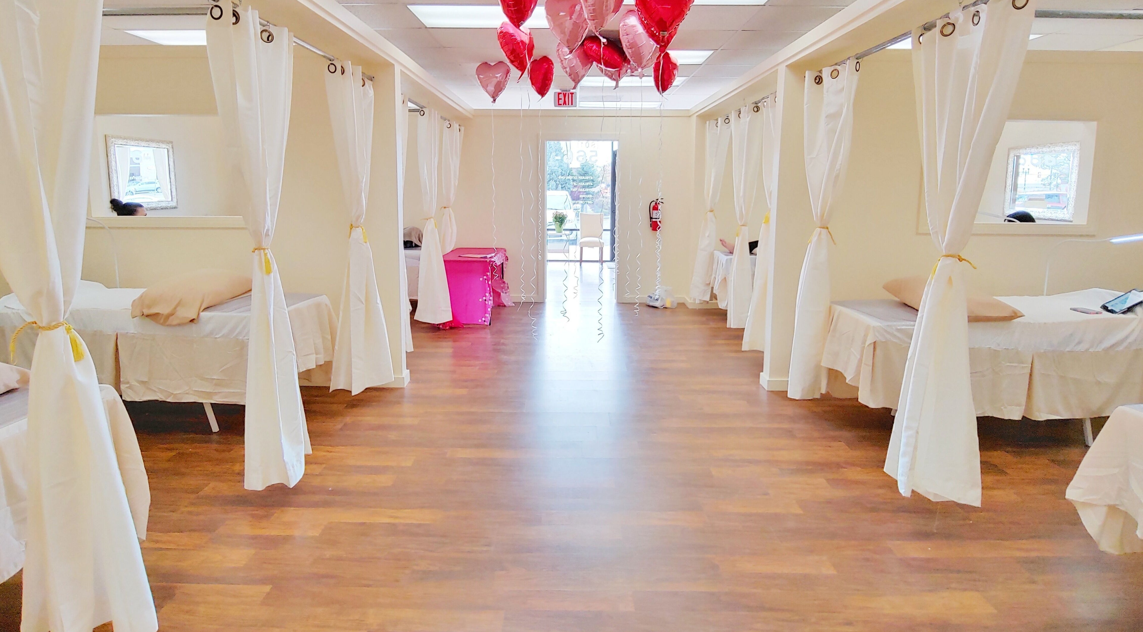 Spacious treatment area with white curtains at Star Lash Studio-West Jordan, West Jordan, Utah, US.