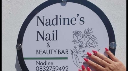 Nadine's Nail & Beauty Bar sign at Techno Park, Stellenbosch, Western Cape, ZA with hand displaying elegant nails.