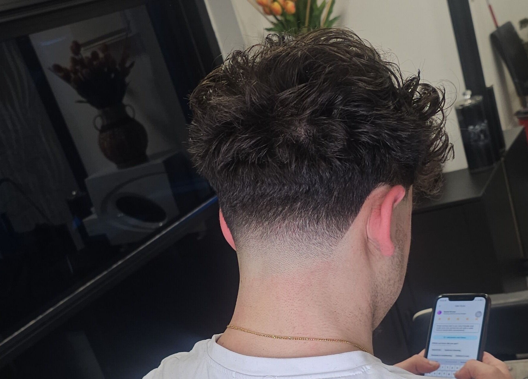 Stylish haircut at Sabi Style salon in Edgware, England, GB showcasing modern hair trends.