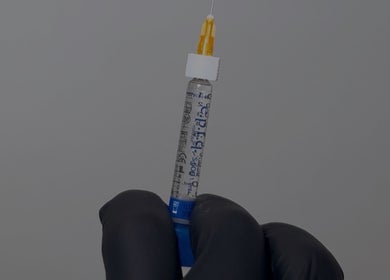 Professional injection preparation at AESTHETICS. By Nurse Ryan, Glasgow, Scotland, GB, showcasing precision care.