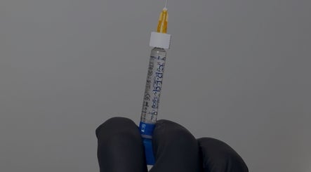 Professional injection preparation at AESTHETICS. By Nurse Ryan, Glasgow, Scotland, GB, showcasing precision care.