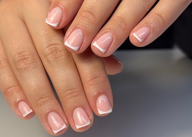 French manicure nails at Nails by Krisztina, Saint Helens, England, GB, showcasing sophisticated style and detail.
