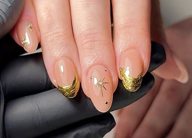Elegant nails with gold accents at Nails by Krisztina, Saint Helens, England, GB.