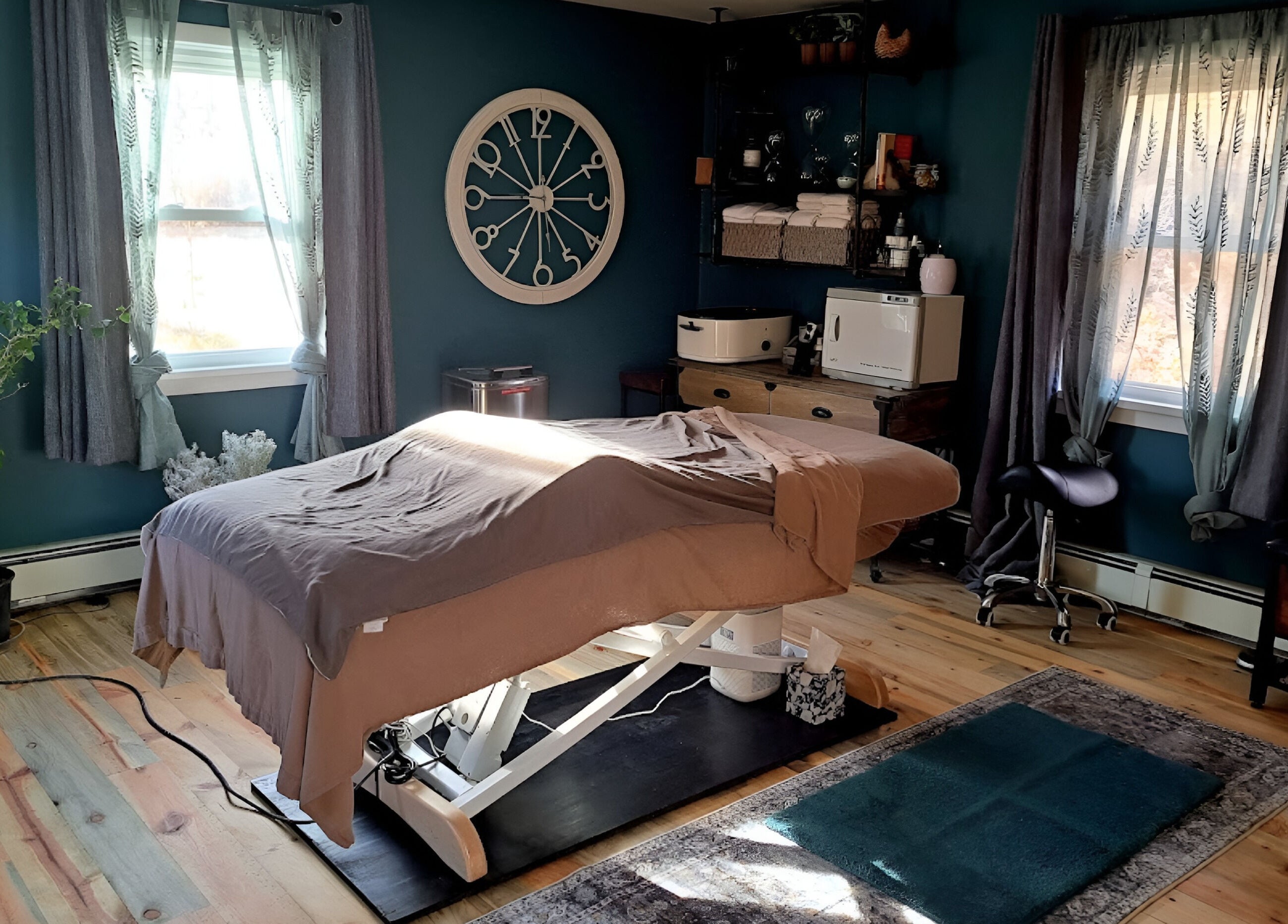 Cozy massage room at Ladder Creek Massage, Grand Junction, Colorado, US, featuring a comfortable massage table.
