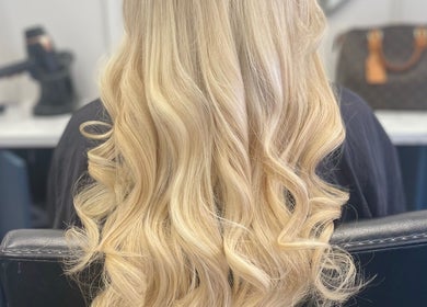 Blonde hair styled in waves at Bella & Co., Newtownards, Northern Ireland, GB.