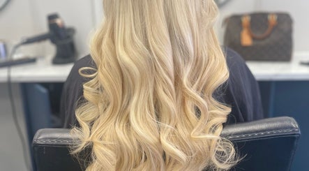 Blonde hair styled in waves at Bella & Co., Newtownards, Northern Ireland, GB.