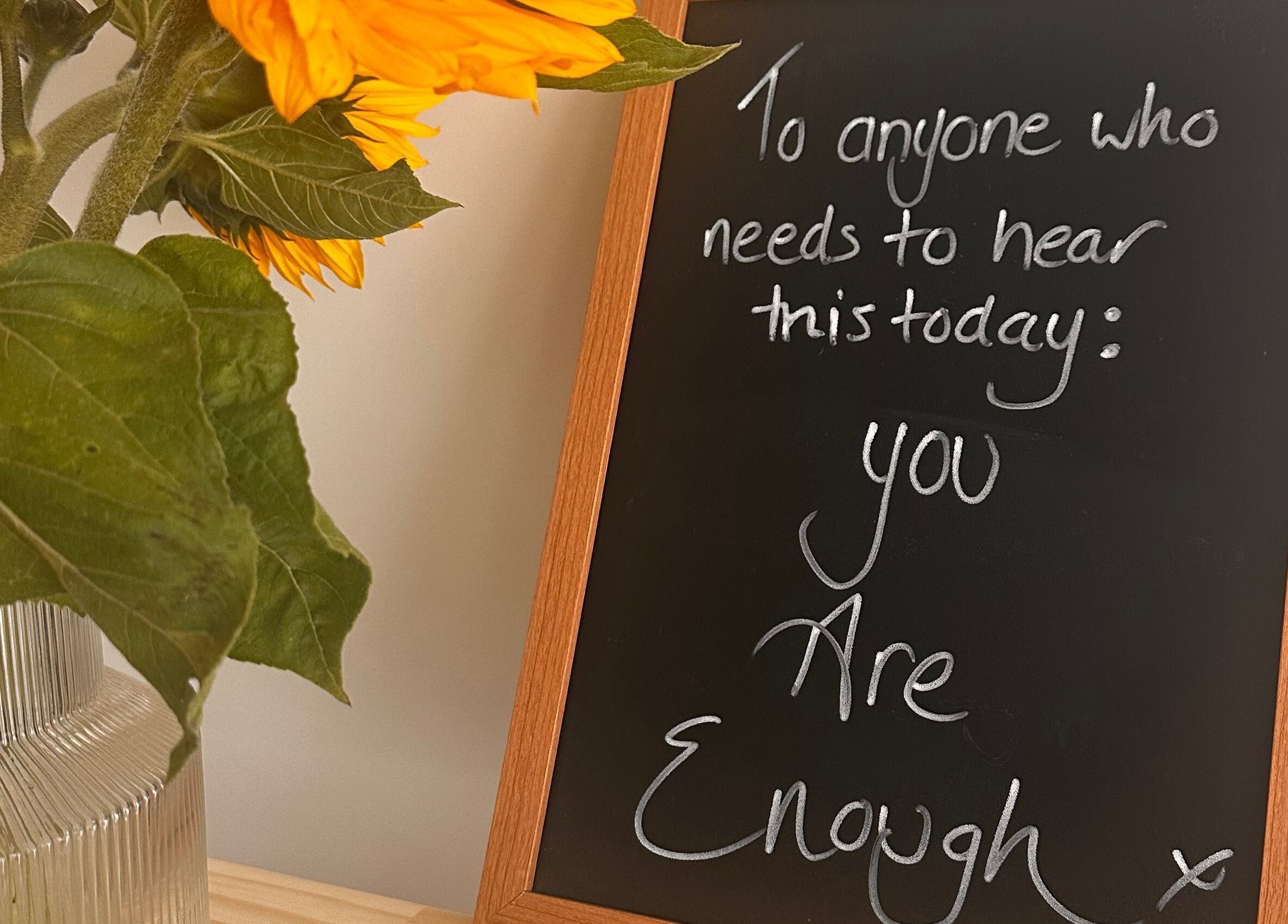 Inspirational message board and sunflowers at Soul Skin Studio and Wellness, Blantyre, GB.