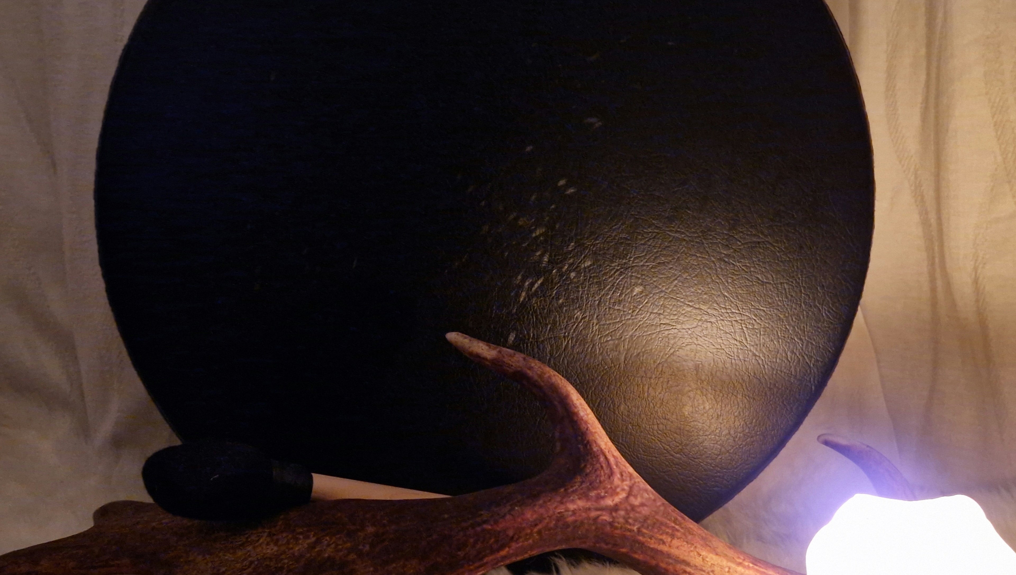 Ambient decor at Spirit, Body and Mind with Lisa - Corby, England, GB. Soft lighting and antler accent.