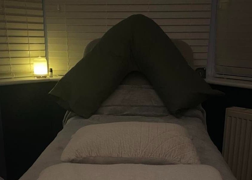 Cozy treatment room at Inner Balance Clinical Reflexology in Methley, England, GB with ambient lighting.