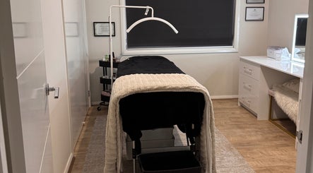 Elegant treatment room at Victoria Makeup Artistry, Mickleham, Victoria, AU, featuring a cozy massage table.