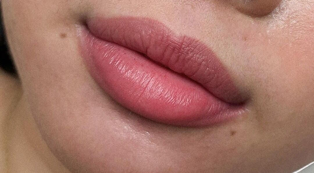 Close-up of beautifully styled lips at Alison Siaotong Studio, Edmonton, Alberta, CA showcasing expert beauty care.