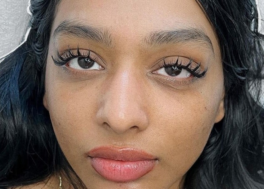 Close-up of woman with elegant eyelashes at Alison Siaotong Studio, Edmonton, Alberta, CA.