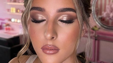 Elegant makeup look by Makeup by Meg Stoke, showcasing shimmering eyes and glossy lips in Stoke-on-Trent, England, GB.