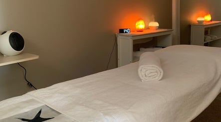 Relaxing massage room at Nancys Beauty and Massage, Clifton Springs, Victoria, AU with warm lighting.