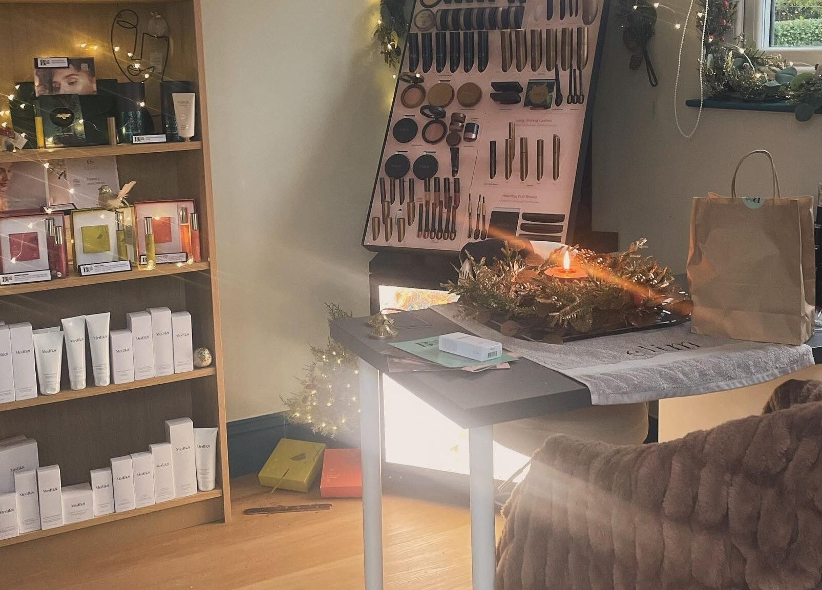 Beauty products and cosmetics display at The Beauty Hideout, Goosnargh, England, GB, creating a cozy ambiance.