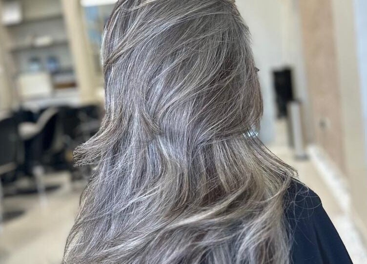 Elegant silver hair styled at Silver Hair - Al Qirwan, Riyadh, Riyadh Province, SA, showcasing chic salon interior.