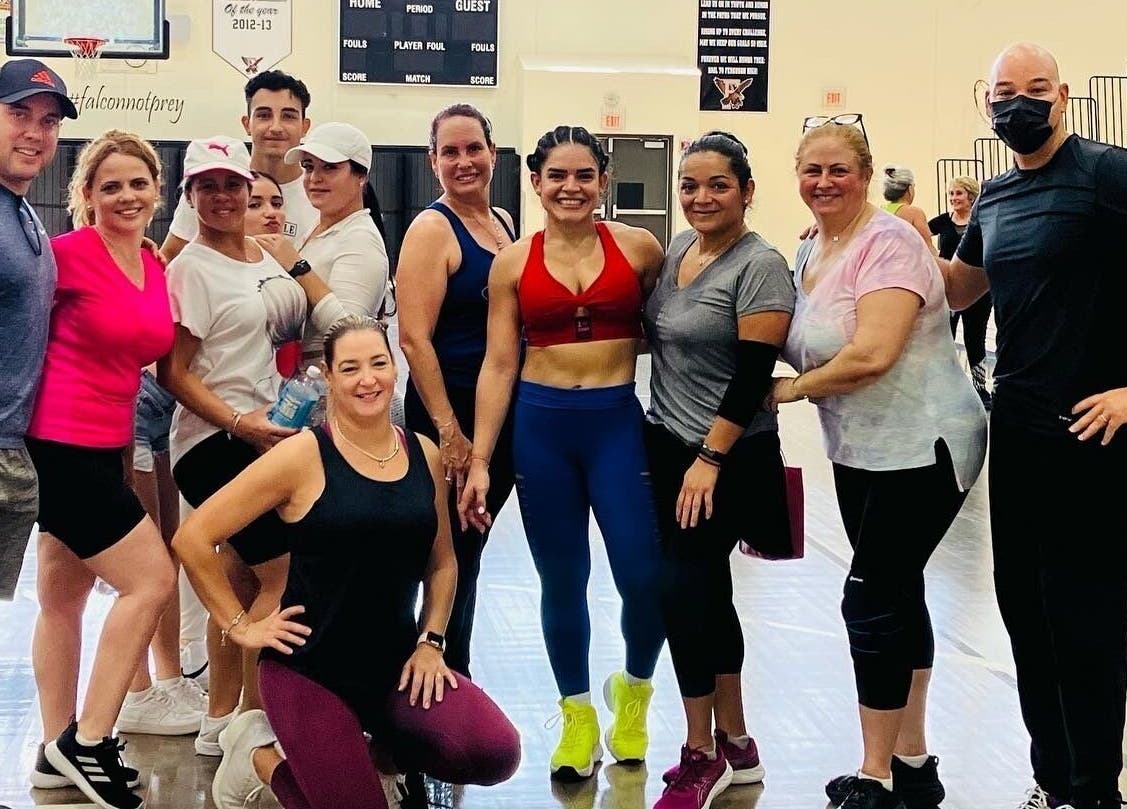 Group fitness session at Grey’s Total Training, Miami, Florida, US, showcasing energetic participants.