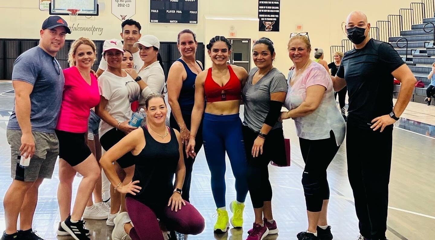 Group fitness session at Grey’s Total Training, Miami, Florida, US, showcasing energetic participants.