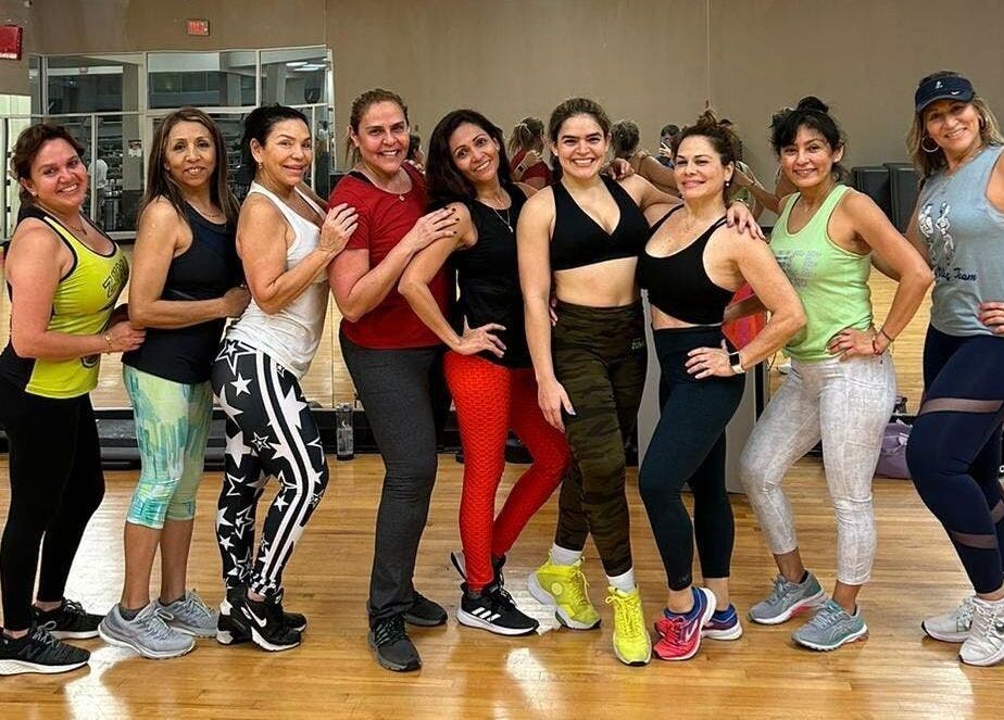 Group workout at Grey’s Total Training in Miami, Florida, US promotes community and fitness.
