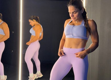 Woman exercising at Grey’s Total Training, Miami, Florida, US, showcasing fitness apparel.