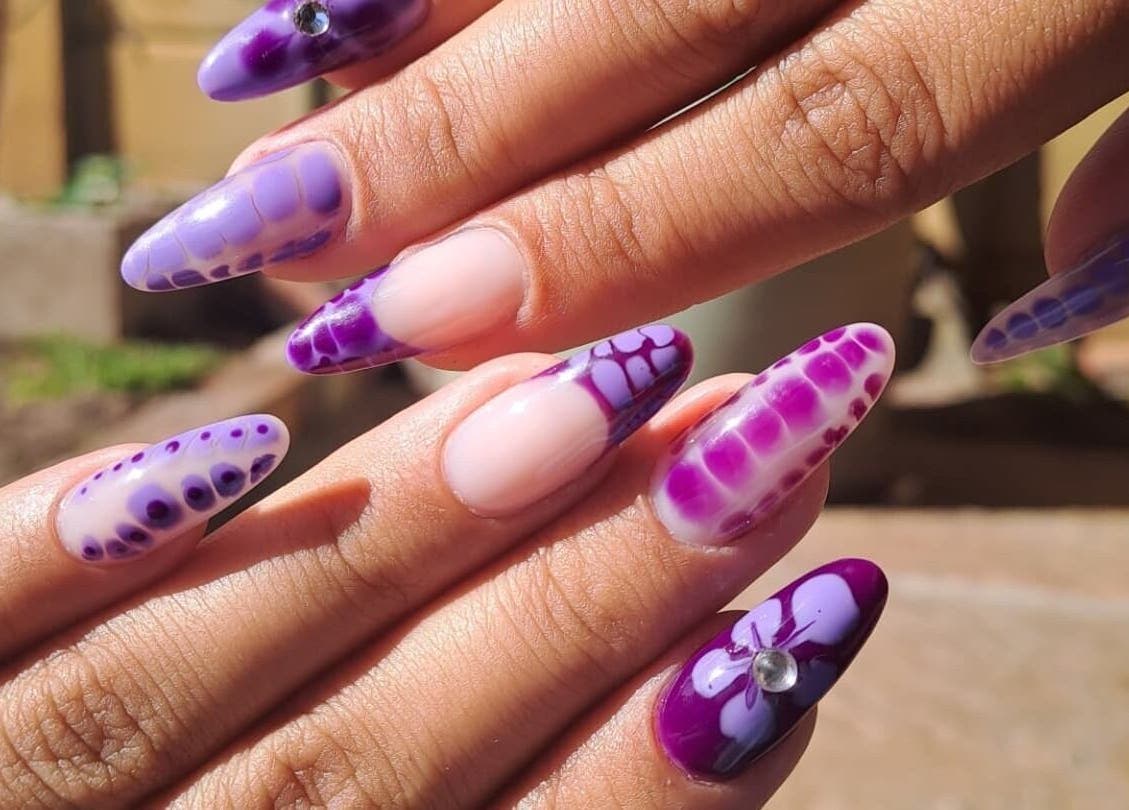 Elegant purple nail art design at Nailed by Chels in Cape Town, Western Cape, ZA, showcasing creativity and style.