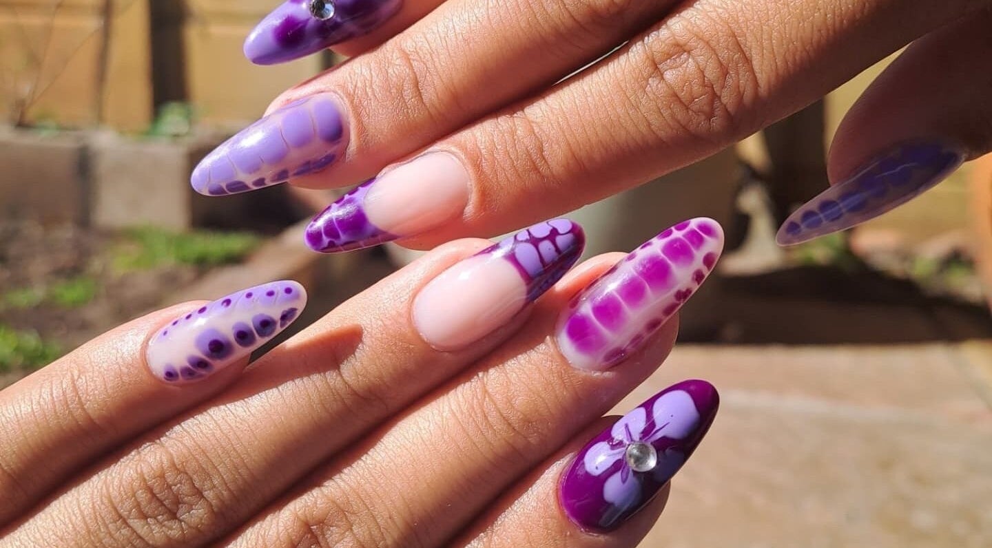 Elegant purple nail art design at Nailed by Chels in Cape Town, Western Cape, ZA, showcasing creativity and style.