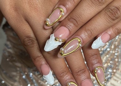 Intricate white and gold nail art at Nailed by Chels in Cape Town, Western Cape, ZA.