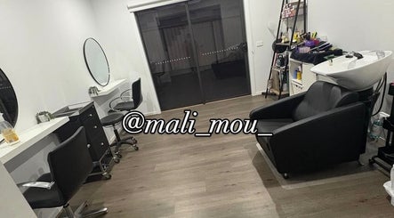 Modern beauty salon at Malimou, featuring styling chairs in Melbourne, Victoria, AU for premium service.