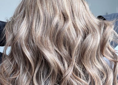 Luxurious wavy hairstyle at Malimou, Endeavour Hills, Victoria, AU. Enhancing beauty with style.