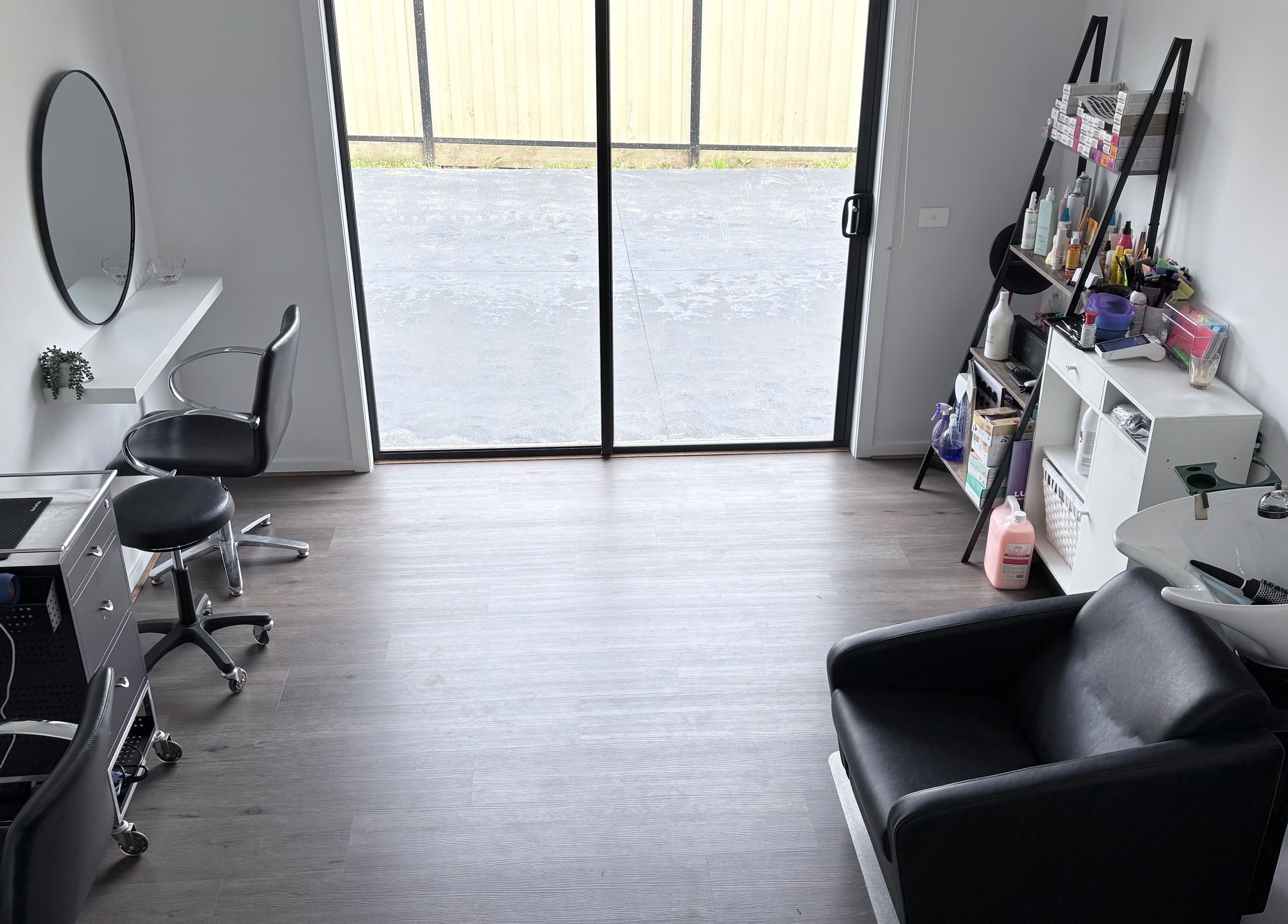 Modern salon interior at Malimou, Endeavour Hills, Victoria, AU featuring aesthetic workspace and styling chair.