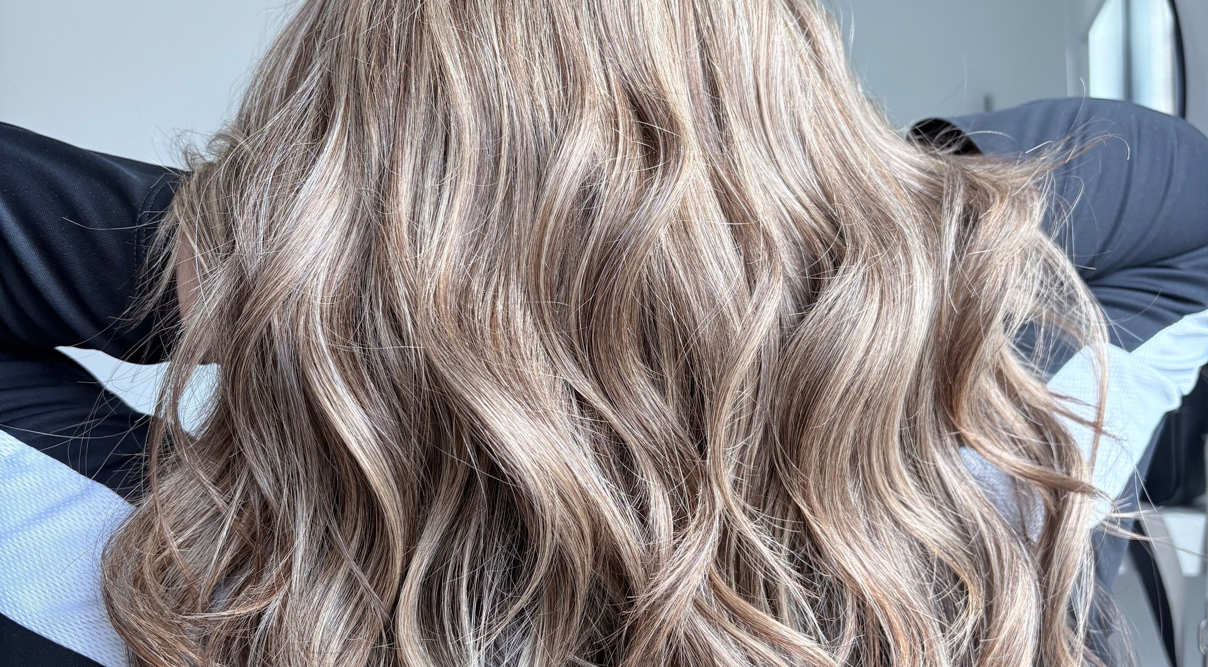 Lustrous wavy hair styled at Malimou, Endeavour Hills, Victoria, AU.