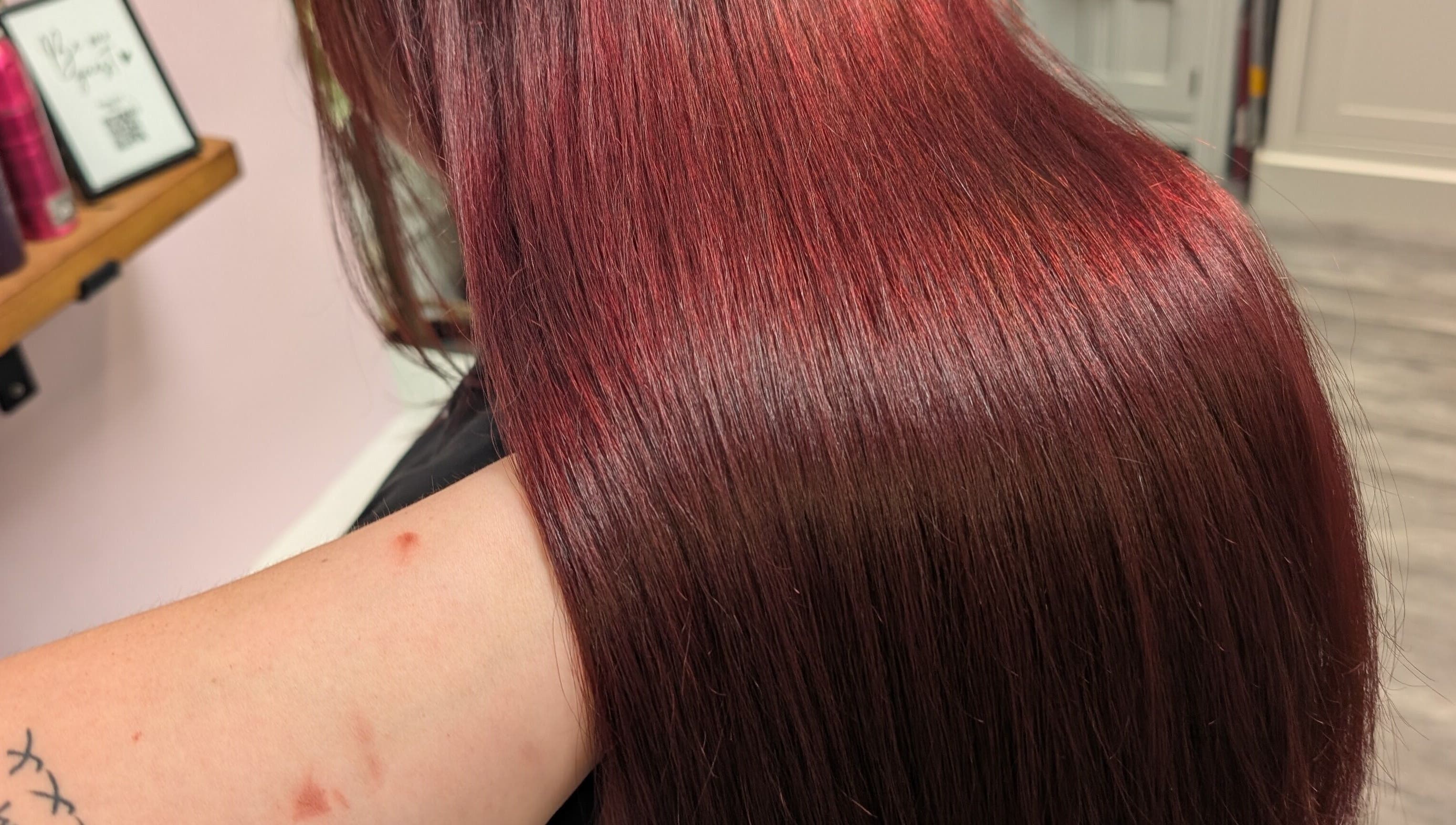 Sleek red hair at Locks by Laura - Salon Studios and Co., Washington, England, GB.