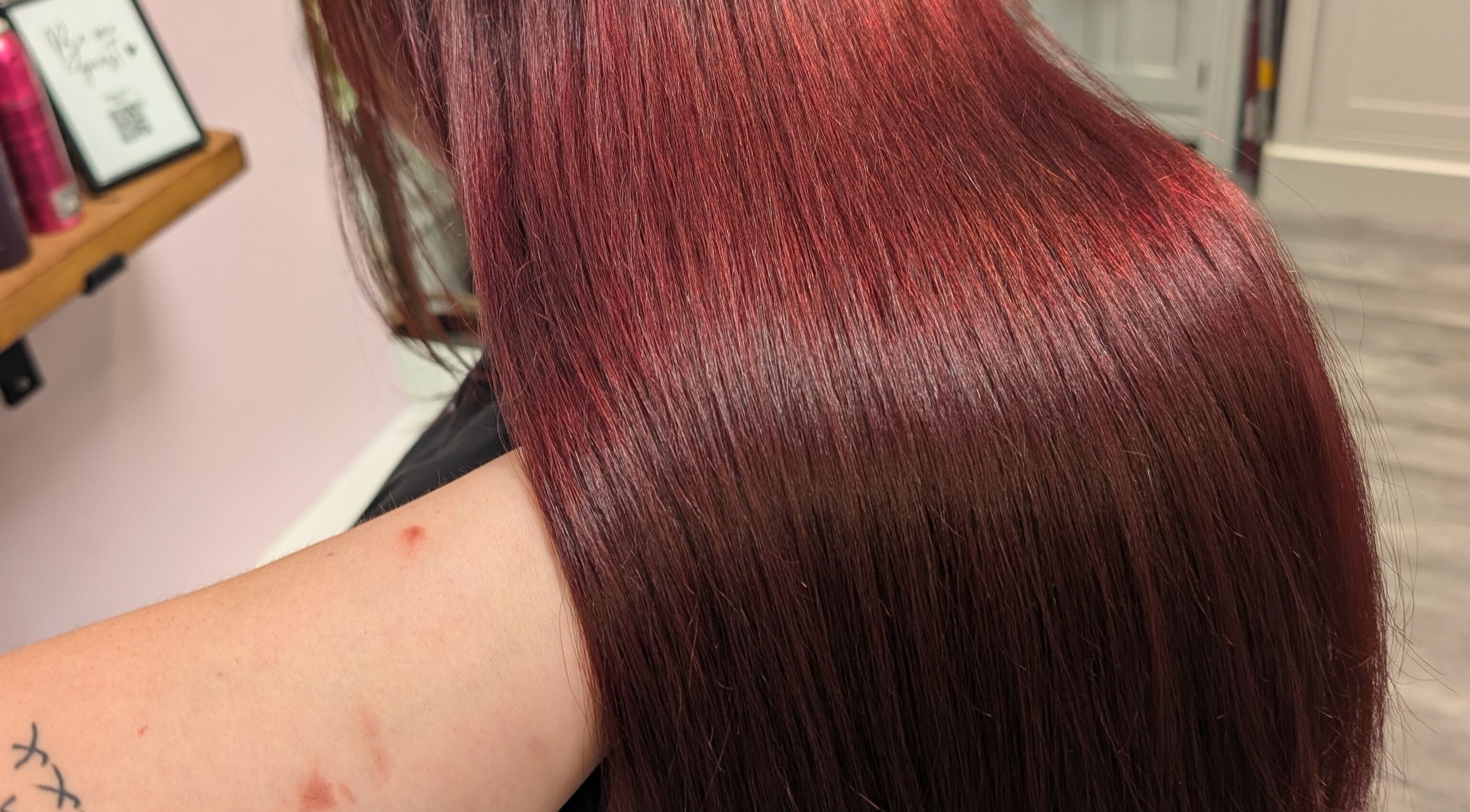 Sleek red hair at Locks by Laura - Salon Studios and Co., Washington, England, GB.