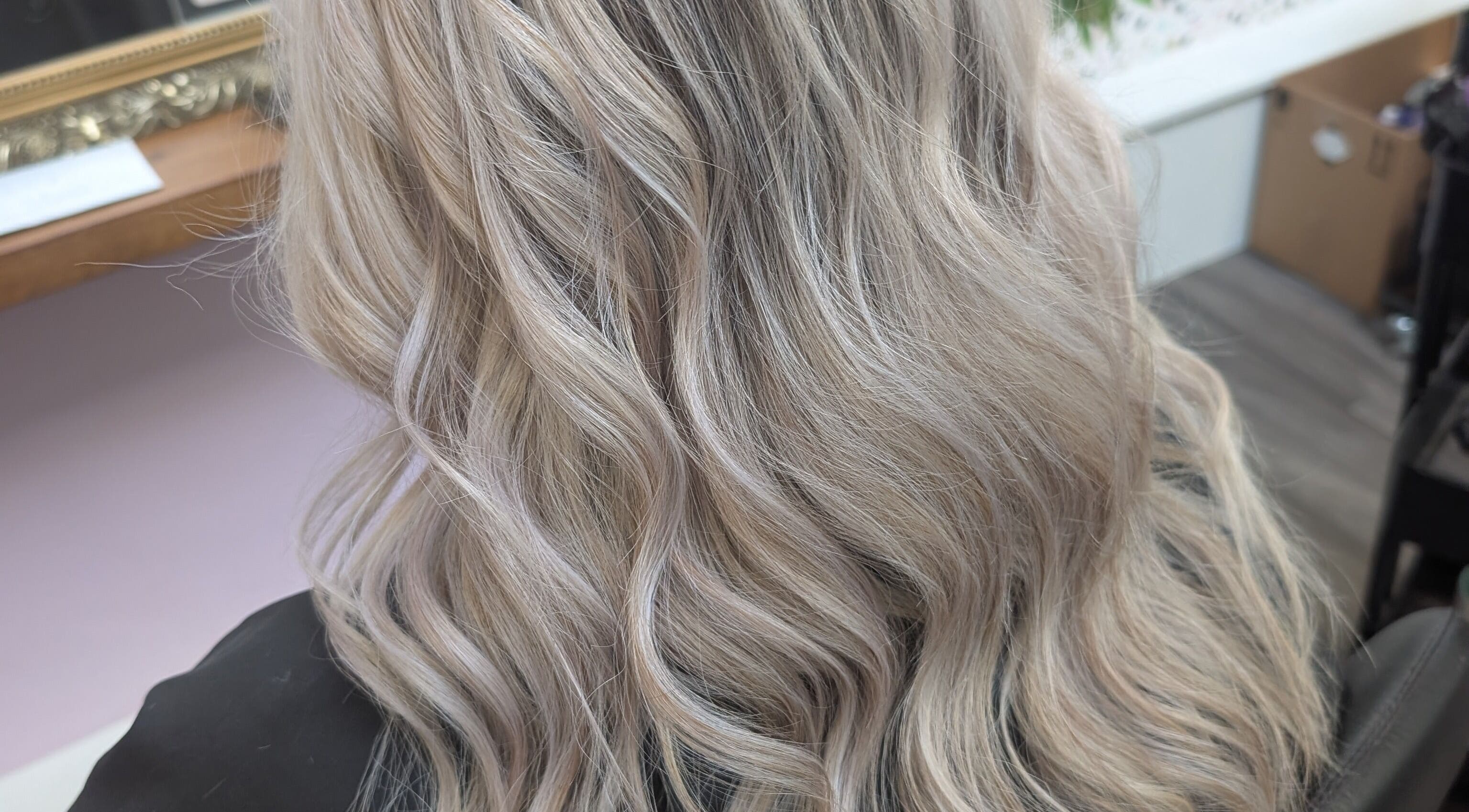 Blonde wavy hair styled at Locks by Laura - Salon Studios and Co. in Washington, England, GB.