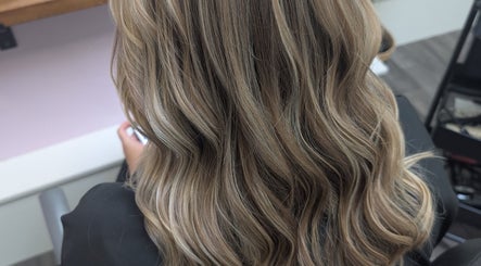 Elegant wavy hairstyle at Locks by Laura - Salon Studios and Co. in Washington, England, GB.