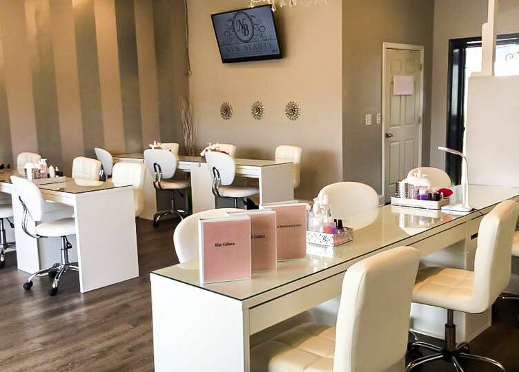 Interior of New Beauty Nail Lounge and Spa, Bellingham, Massachusetts, featuring elegant nail stations.