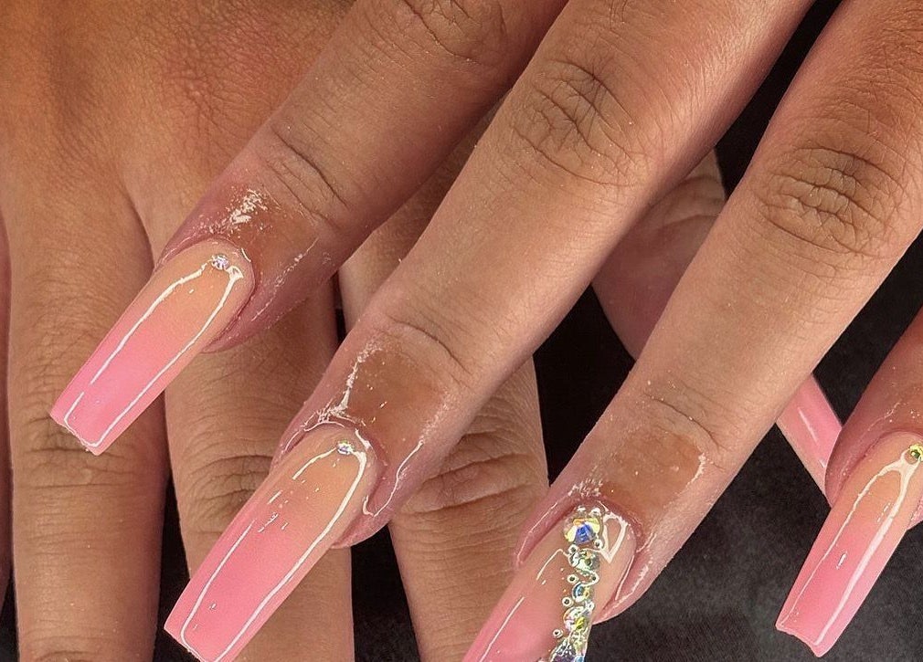 Stunning pink acrylic nails with rhinestones at Beauty By Kristina Fa, Yagoona, New South Wales, AU.