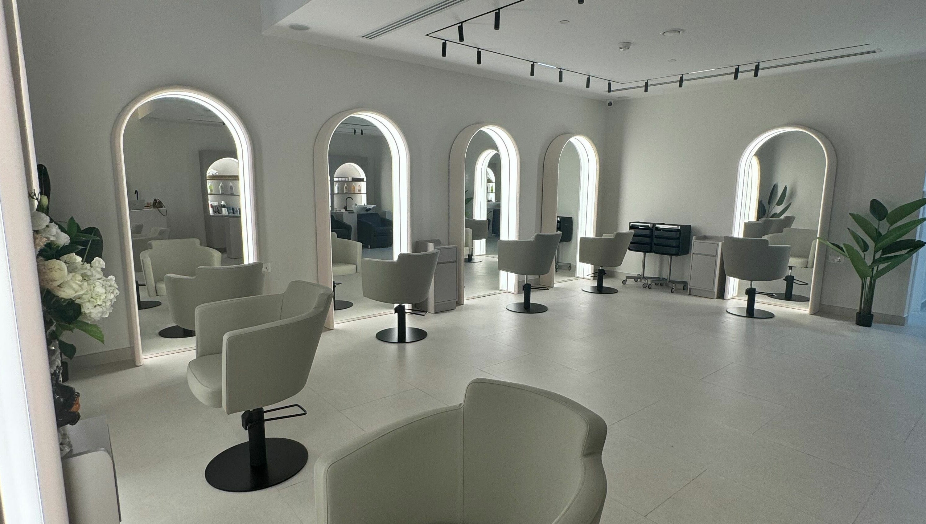 Sleek salon interior at Sasalon Dubai with modern chairs and mirrors in Dubai, Dubai, AE.