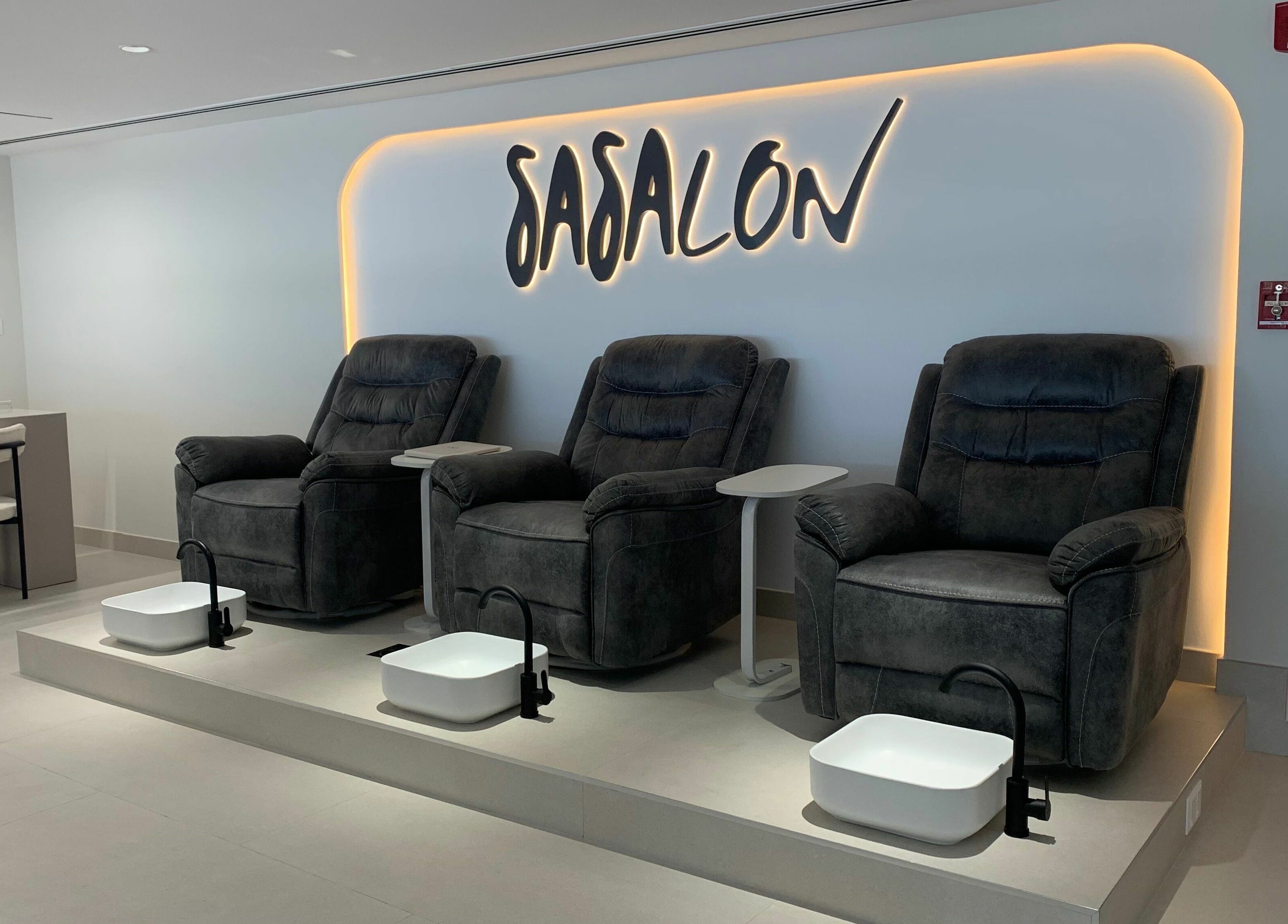 Luxury pedicure chairs at Sasalon Dubai, Dubai, AE offer a tranquil spa-like experience.