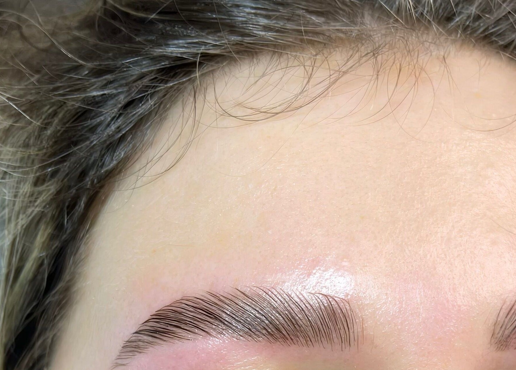 Close-up of expertly styled eyebrows at By Liv, Doncaster, England, GB. Achieve elegant brow perfection.